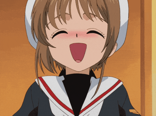 a close up of a girl with her mouth open