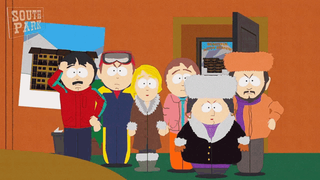 a group of south park characters standing in front of a sign
