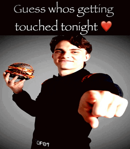 a man holding a hamburger with the words guess whos getting touched tonight on the bottom