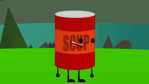 a can of soup is laying on the ground