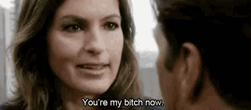 a man and a woman are looking at each other and the woman is saying `` you 're my bitch now . ''