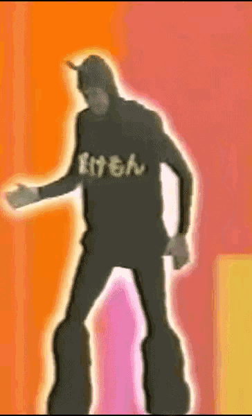 a man wearing a black shirt that says ' ehm ' on it