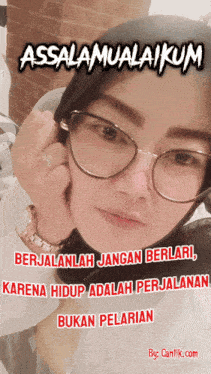 a woman wearing glasses and a hijab has the words assalamualaikum written on her face