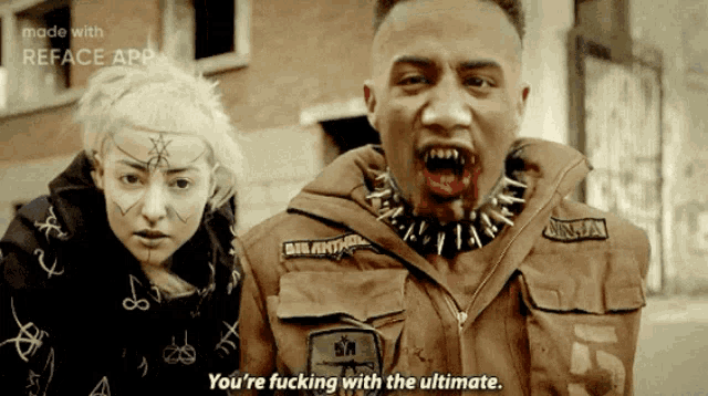 a man and a woman are standing next to each other and the man is wearing a jacket that says ninja