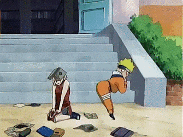 a man and a woman are kneeling on the ground in front of some stairs