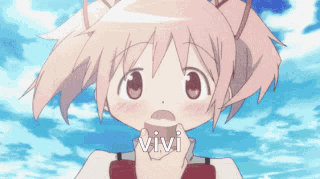 a girl with pink hair and the word vivi on her shirt