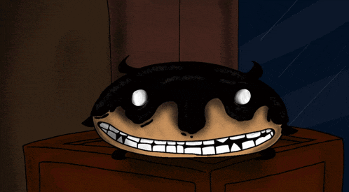 a cartoon drawing of a monster with horns and big teeth