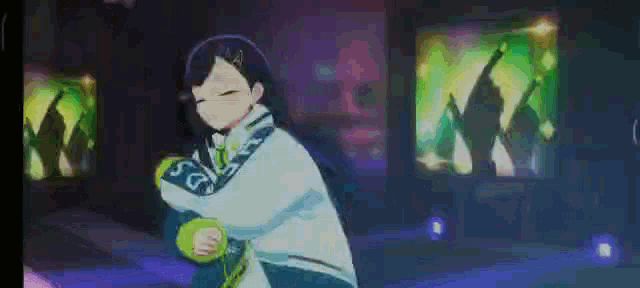 a girl is dancing in a dark room with a lot of lights behind her .