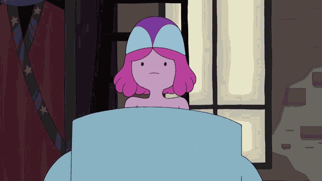 a cartoon character with pink hair and a blue hat is laying under a blue blanket