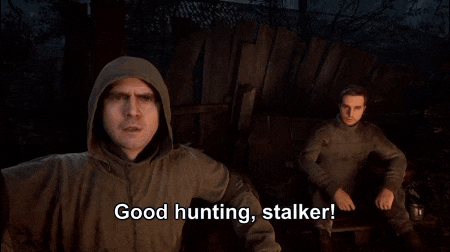 a man in a hooded jacket is saying good hunting stalker