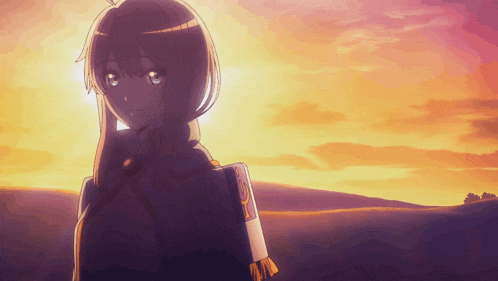 a girl stands in a field with a sunset in the background and a book on her shoulder