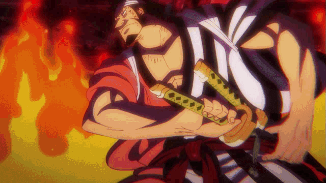 a man in a striped shirt is holding a sword in front of flames