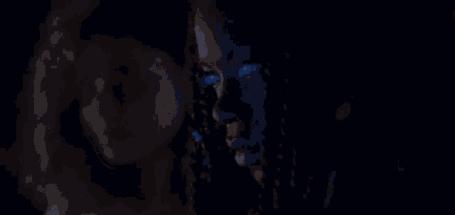 a close up of a woman 's face with dreadlocks and a blue light coming out of her eyes