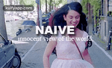 a woman in a white dress is walking down a street with the words naive innocent view of the world .