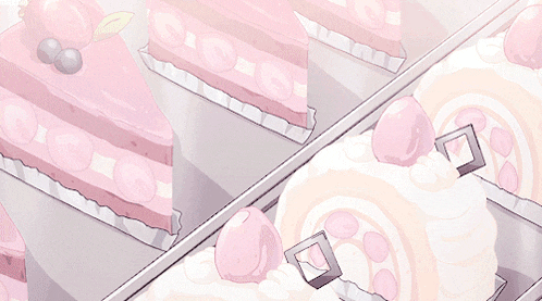a bunch of pink and white cakes on display