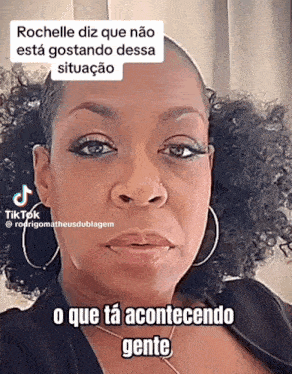 a woman with curly hair and hoop earrings has a tiktok account