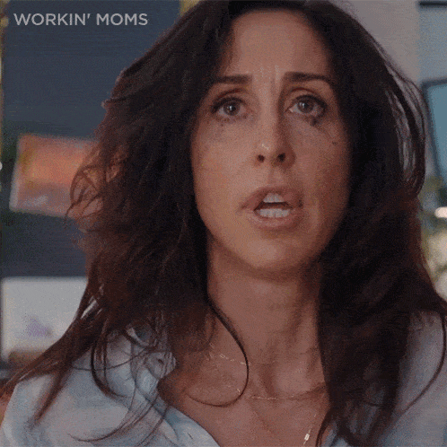 a close up of a woman 's face with the words workin ' moms on the bottom