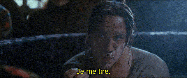 a close up of a man 's face with the words je me tire