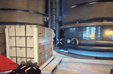 a video game is being played in a room with boxes on the floor