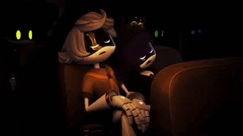 two cartoon characters are sitting next to each other in a dark room holding hands .