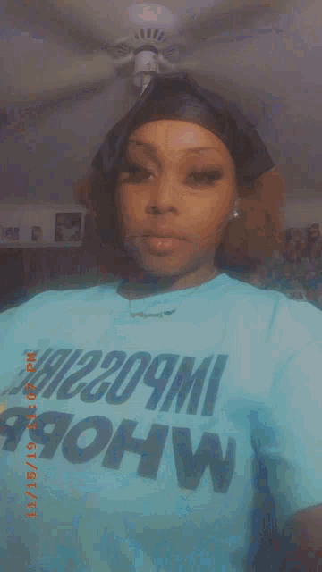 a woman wearing a t-shirt that says john on it