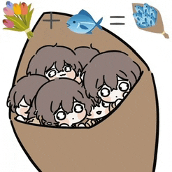 a group of children are sitting in a box with a fish and flowers