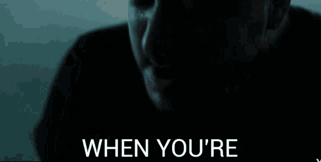 a close up of a man 's face with the words when you 're on the bottom