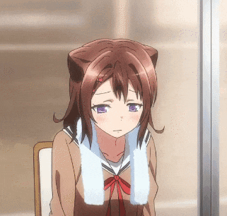 a girl with cat ears and a white towel around her neck