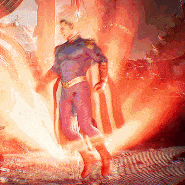 a man in a superhero costume is standing in front of a wall of flames
