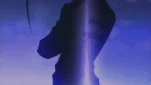 a person in a dark room with a purple light coming out of their hand