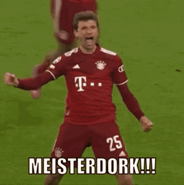 a soccer player wearing a t-mobile jersey celebrates on the field
