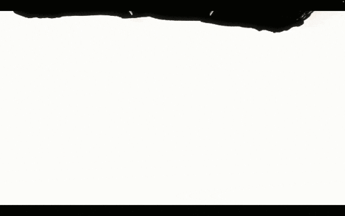 a silhouette of a person standing on a tile floor
