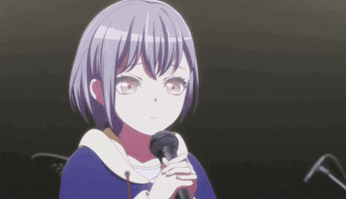a girl with purple hair is holding a microphone in front of her face