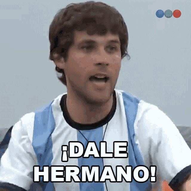 a man in a blue and white striped shirt says dale hermano