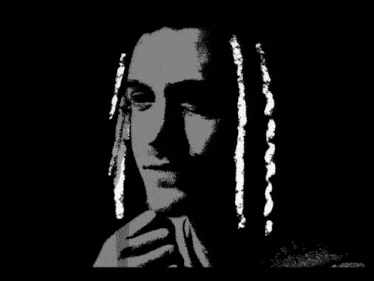 a black and white drawing of a man with dreadlocks