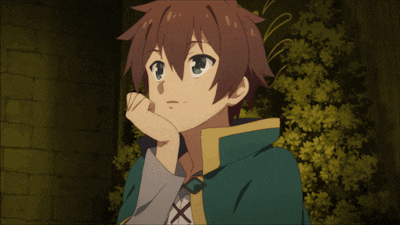 a boy with brown hair and green eyes is looking up