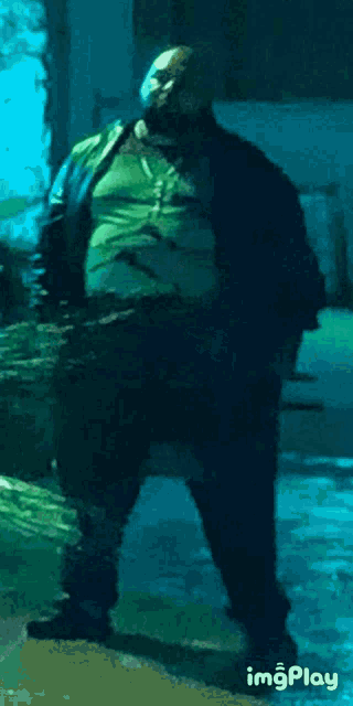 a painting of a fat man standing in a dark room with the words imgplay at the bottom