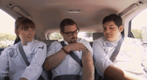 a group of people in a car with the word bravo on the bottom right