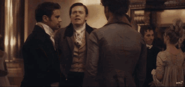 a group of men are standing in a room and one of them says your future wives