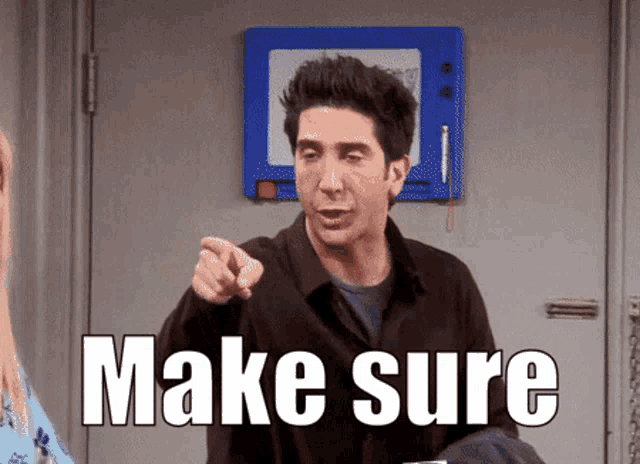 a man is pointing at someone with the words make sure written below him