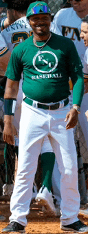 a man in a green shirt that says nc baseball