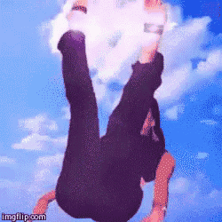 a gif of a person doing a handstand with the words imgflip.com below it