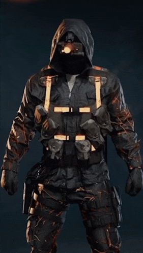 a man wearing a hooded jacket and a mask