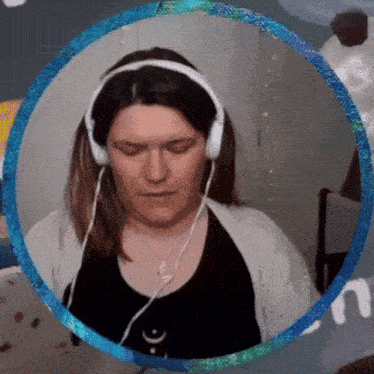 a woman wearing headphones has a blue circle around her head
