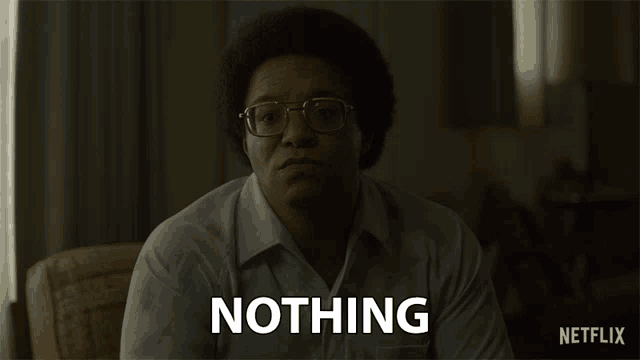 a man wearing glasses says nothing in a netflix advertisement