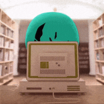 a cartoon character is sitting in front of a computer screen
