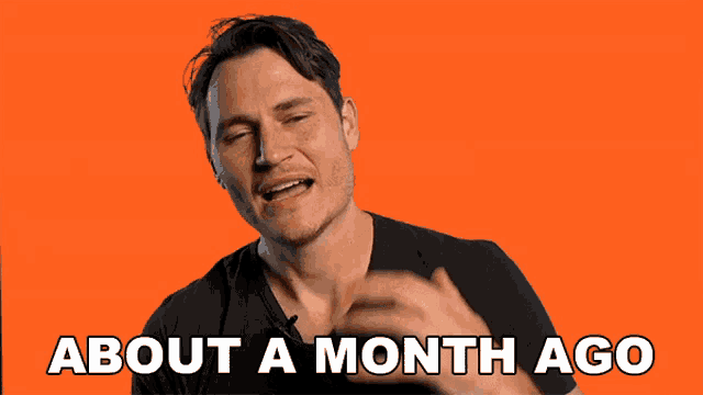 a man says " about a month ago " in front of a orange background