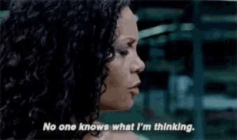 a woman with curly hair is talking and says `` no one knows what i 'm thinking . ''