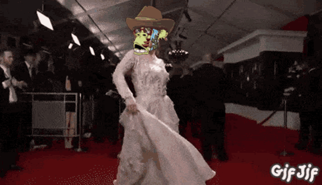 a gif of a woman in a wedding dress with a monkey on her head