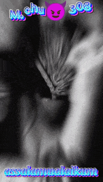 a black and white photo of a person 's eye with a purple devil face and the words m chu 308